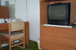 A television and/or entertainment centre at Johnstown Motel