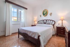 Postel nebo postele na pokoji v ubytování Villa en Son Gall Ciutadella + 17 fotografií