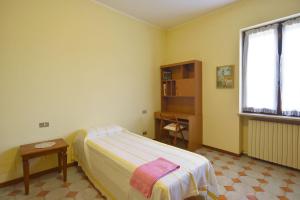 Posteľ alebo postele v izbe v ubytovaní Casa Nonna Rina