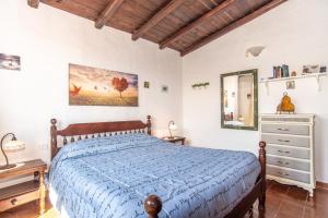 Ένα ή περισσότερα κρεβάτια σε δωμάτιο στο Splendida Vista su Tavolara