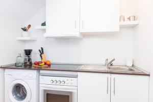 A kitchen or kitchenette at Cala Serena Beach 6