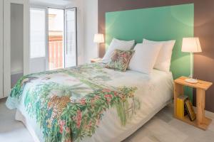 Posteľ alebo postele v izbe v ubytovaní Luminoso apartamento en el centro de Cádiz