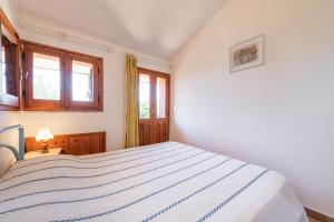 Accu is prezzus I 30mt dal mare客房内的一张或多张床位