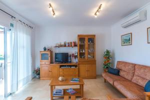 Telewizja i/lub zestaw kina domowego w obiekcie Villa Bini Tuduri