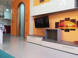 Casa vacanze Virginia Deluxe in Salento tesisinde bir televizyon ve/veya eğlence merkezi