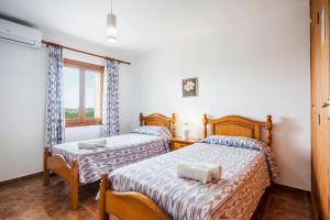 Postel nebo postele na pokoji v ubytování Villa Damian 12