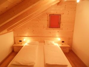 Posteľ alebo postele v izbe v ubytovaní Jörglmoar