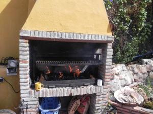 Barbecue disponible mis à disposition des clients de la maison de vacances