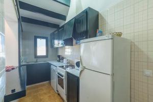 Kuchyň nebo kuchyňský kout v ubytování Casa 5 Q en Complejo Binisafua