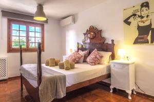 Postel nebo postele na pokoji v ubytování Casa Mamita Ibiza