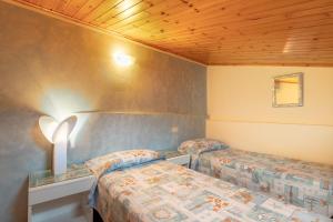 Postel nebo postele na pokoji v ubytování Simona Vista Mare