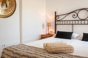 Posteľ alebo postele v izbe v ubytovaní Villa Con Encanto Cerca De La Playa