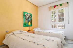 Posteľ alebo postele v izbe v ubytovaní Villa Con Encanto Cerca De La Playa