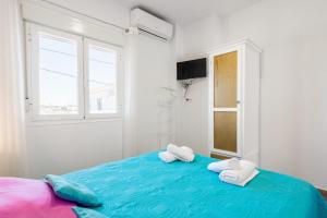 Postel nebo postele na pokoji v ubytování Apartamento La Higuera 2