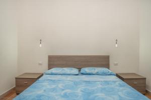 Postel nebo postele na pokoji v ubytování Luna