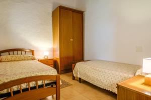 Postel nebo postele na pokoji v ubytování Can Consul