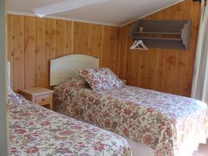 Cama o camas de una habitación en Sueños de Sur B&B