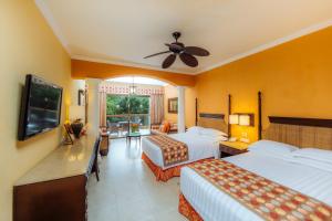 Letto o letti in una camera di Barceló Maya Palace - All Inclusive