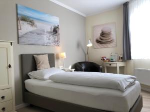 Кровать или кровати в номере Klausdorfer Hof