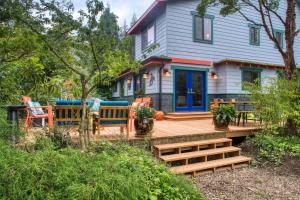 a wooden deck in front of a house at Sehome Garden Inn in Bellingham