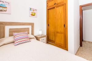 Posteľ alebo postele v izbe v ubytovaní Apartamento en Vejer