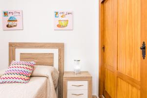 Posteľ alebo postele v izbe v ubytovaní Apartamento en Vejer