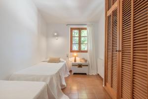 Posteľ alebo postele v izbe v ubytovaní Villa Creus