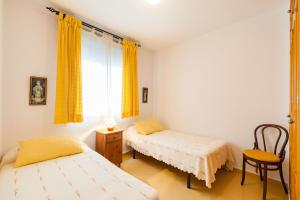 Posteľ alebo postele v izbe v ubytovaní Calas de Conil Duplex B