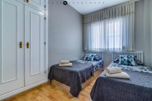 Posteľ alebo postele v izbe v ubytovaní 108 Apartament Fabulus + 6 fotografií