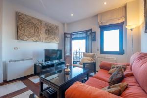 TV a/nebo společenská místnost v ubytování La casa de La Alhambra