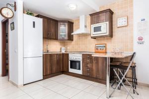 Kuchyň nebo kuchyňský kout v ubytování Apartamento el Carmen + 20 fotografií