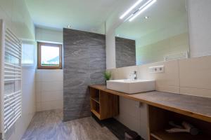 Koupelna v ubytování Ferienwohnung Leitinger + 12 fotografií