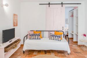 Posteľ alebo postele v izbe v ubytovaní Casa Lorca