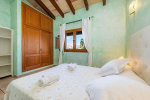 Ein Bett oder Betten in einem Zimmer der Unterkunft Los tres soles