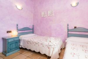 Ein Bett oder Betten in einem Zimmer der Unterkunft Los tres soles