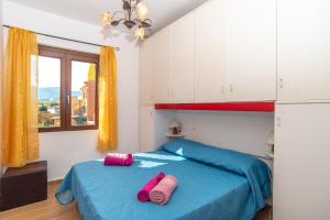 A bed or beds in a room at Casa Albina