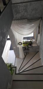 an overhead view of a room with a white curtain at Pensiune EDEN in Slatina