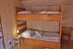 Poschodová posteľ alebo postele v izbe v ubytovaní Villa Toscana