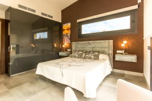Ein Bett oder Betten in einem Zimmer der Unterkunft Villa Ca Na Marga