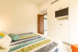 Ein Bett oder Betten in einem Zimmer der Unterkunft Villa Ca Na Marga