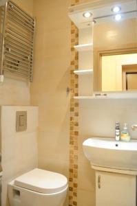 Ένα μπάνιο στο 1A Moment Apartment +6 φωτογραφίες