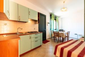 Η κουζίνα ή μικρή κουζίνα στο Appartamenti Cavour Codice E