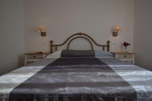 Un pat sau paturi într-o cameră la Il Cisto