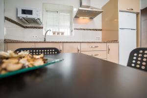 Kuchyňa alebo kuchynka v ubytovaní Apartamento Chiclana 1 + 10 fotografií