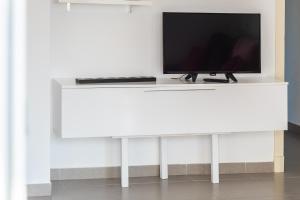Telewizja i/lub zestaw kina domowego w obiekcie Casa Grullo