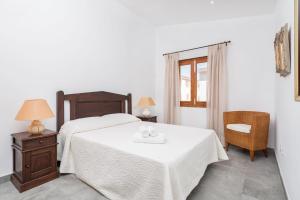 Ein Bett oder Betten in einem Zimmer der Unterkunft S Olivera