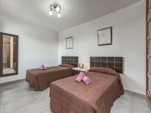 A bed or beds in a room at Montevela