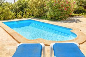 The swimming pool at or close to Sa Barraca d'en Caminer