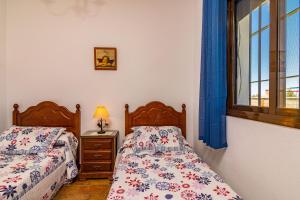 Postel nebo postele na pokoji v ubytování Familia Amaya Gonzalez