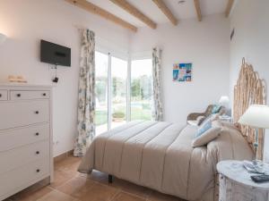 Postel nebo postele na pokoji v ubytování Villa De Lujo Frente A La Playa